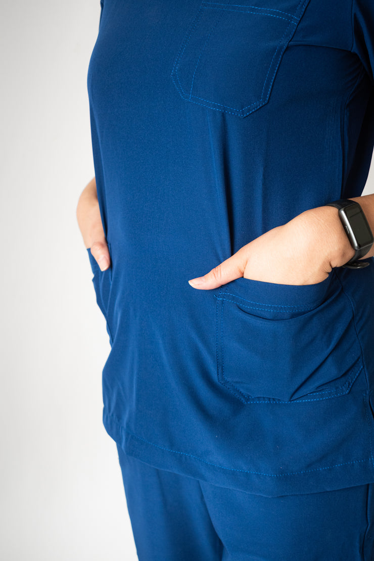 SCRUB ANTIFLUIDOS AZUL REY DAMA