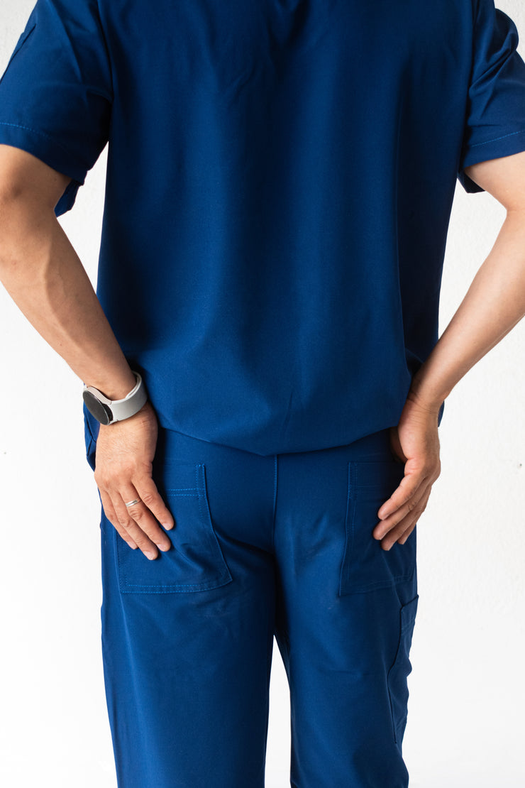 SCRUB ANTIFLUIDOS AZUL REY HOMBRE