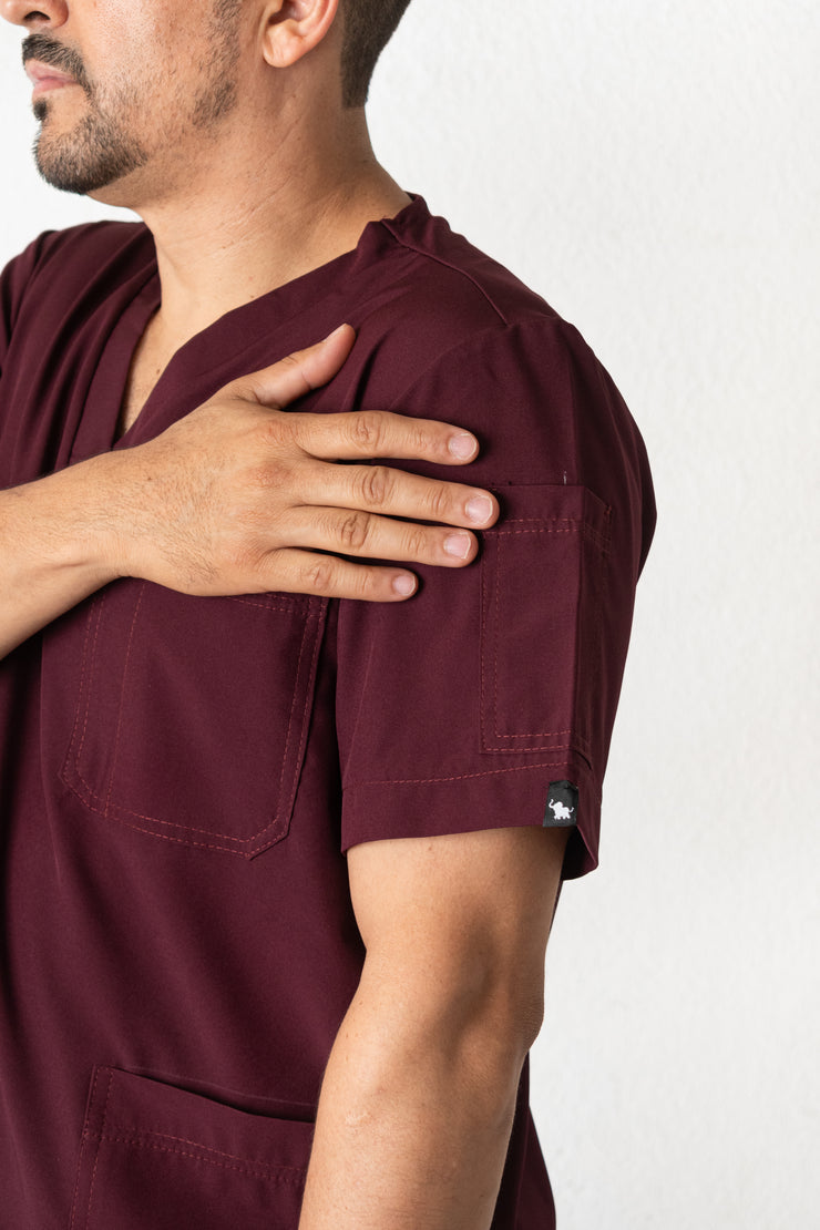 SCRUB ANTIFLUIDOS VINO HOMBRE