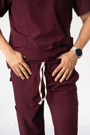 SCRUB ANTIFLUIDOS VINO HOMBRE